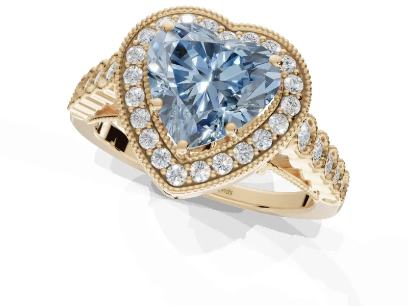Fancy Blue Heart-Shaped Lab-Grown Diamond Milgrain Halo Solitaire Ring Set in Yellow Gold with Bezel Set Side Stones and Pavé Band