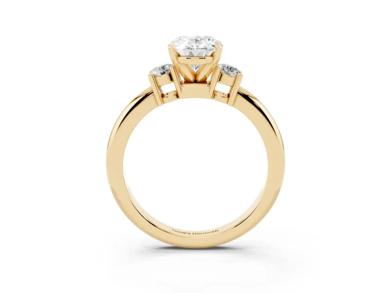 Three-Stone Oval Cut Diamond Ring Set in Yellow gold with Prong Setting and Plain Band