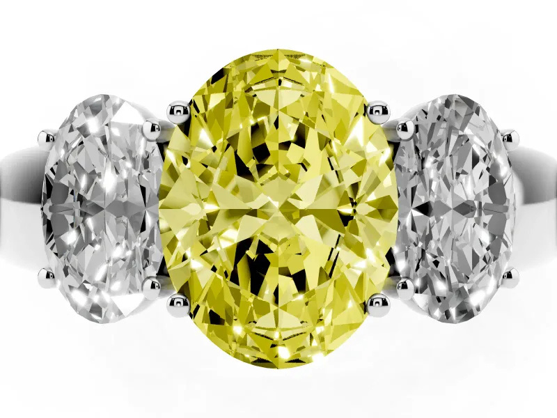 Fancy Yellow Three-Stone Oval Cut Diamond Ring Set in White gold with Matching Prong Settings and Plain Band