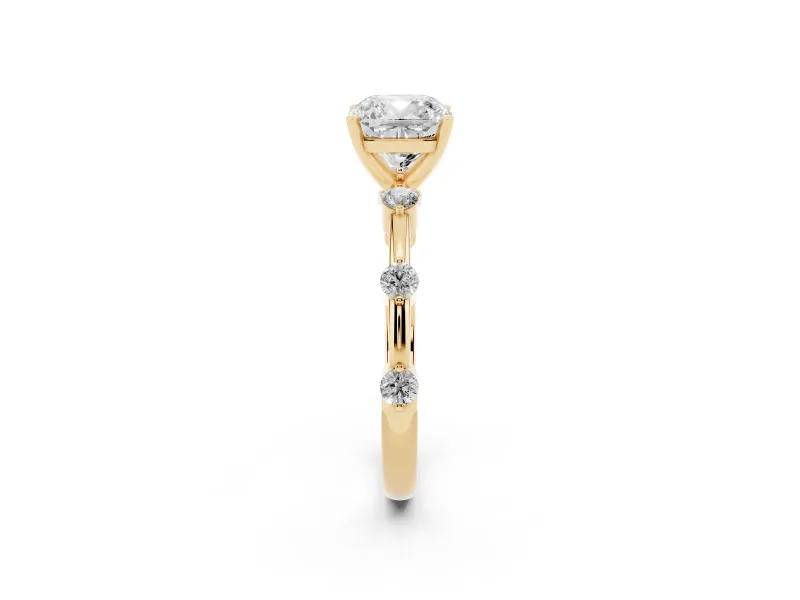 Cushion Cut Diamond Solitaire Ring Set in Yellow gold with Bezel Set Side Stones and Prong Setting