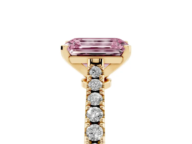 Fancy Pink Emerald Cut Diamond Solitaire Engagement Ring Set in Yellow gold with Delicate Pavé Band and Prong Setting