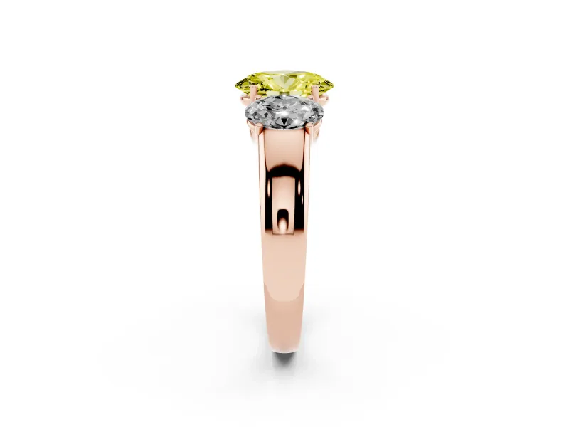 Fancy Yellow Three-Stone Oval Cut Diamond Ring Set in Rose gold with Matching Prong Settings and Plain Band