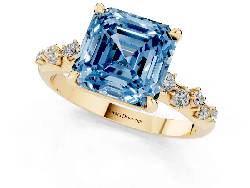 Fancy Blue Asscher Cut Diamond Solitaire Vine Band Ring Set in Yellow gold with Round Accents and Prong Setting