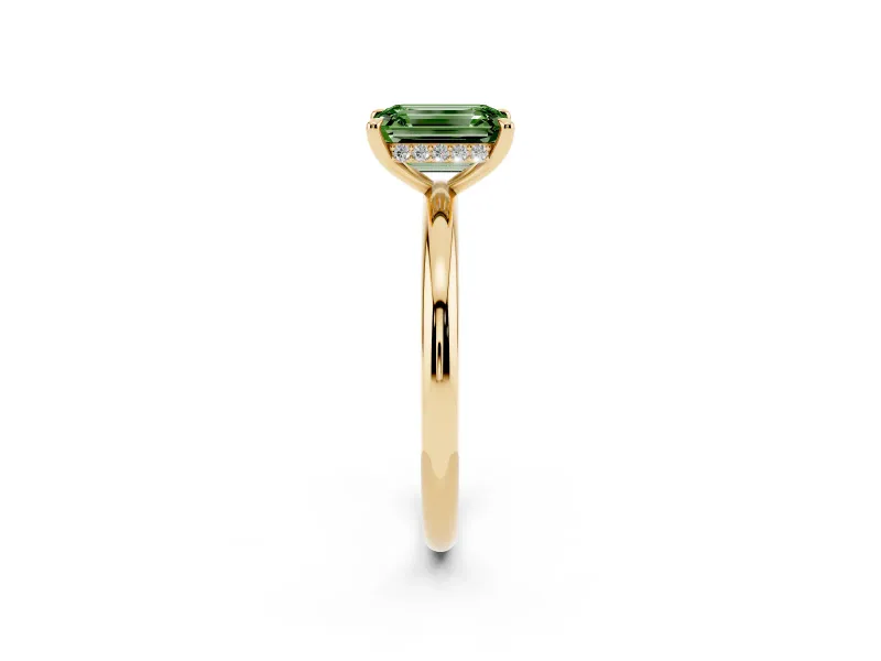 Fancy Green Emerald Cut Diamond Solitaire Ring Set in Yellow gold with Thin Band and Prong Setting