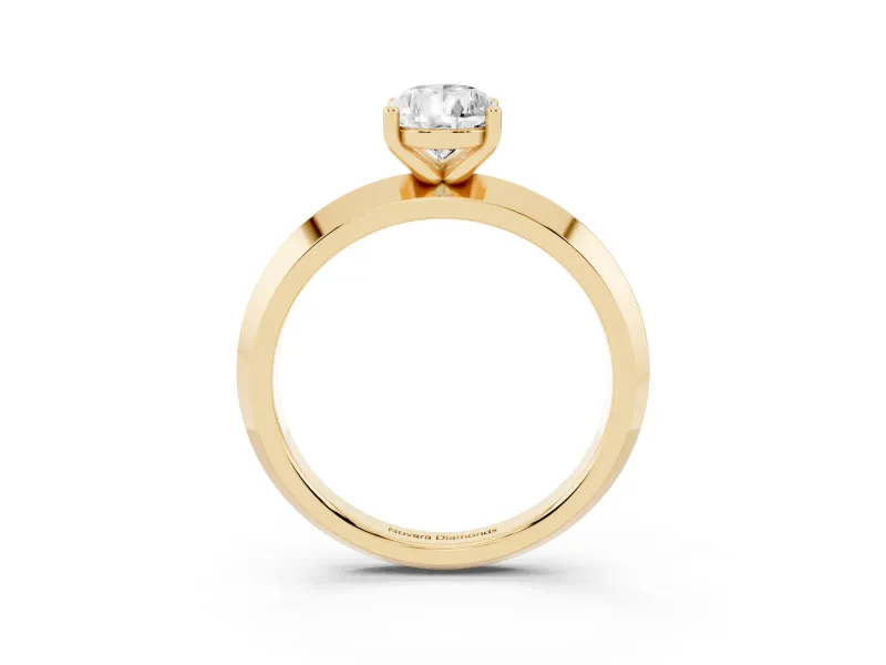 Pear Cut Diamond Solitaire Engagement Ring Set in Yellow gold with Flat Band and Prong Setting