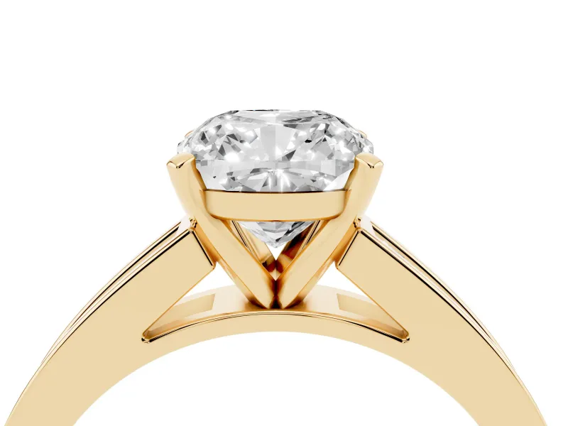 Cushion Cut Diamond Solitaire Ring Set in Yellow gold with Channel-Set Band and Prong Setting