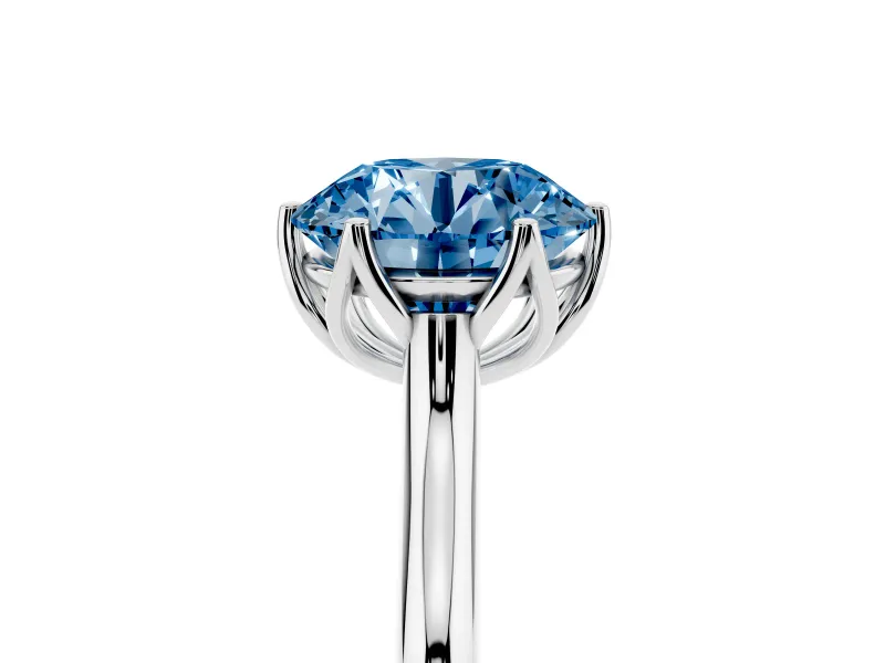 Fancy Blue Round Cut Diamond Solitaire Cathedral Ring Set in White gold with Prong Setting