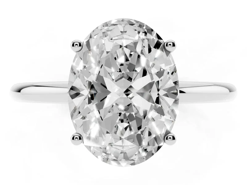 Oval Cut Diamond Solitaire Engagement Ring Set in Platinum with Thin Band and Prong Setting