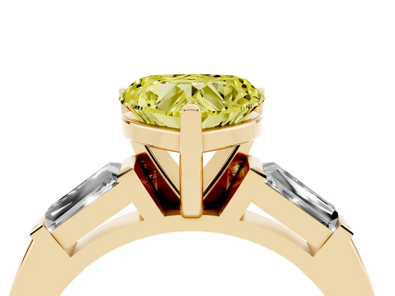 Fancy Yellow Heart Cut Diamond Solitaire Ring Set in Yellow gold with Tapered Baguette Side Stones and Prong Setting