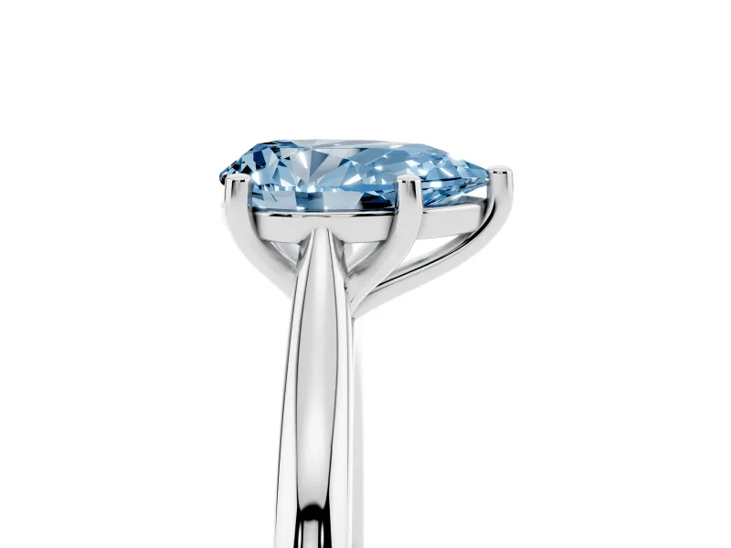 Fancy Blue Pear Cut Diamond Solitaire Ring Set in Platinum with Cathedral Band and Prong Setting