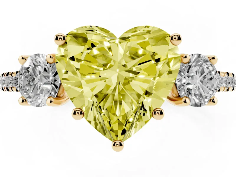 Fancy Yellow Heart Cut Diamond Three-Stone Ring Set in Yellow gold with Pavé Band and Graduated Sides