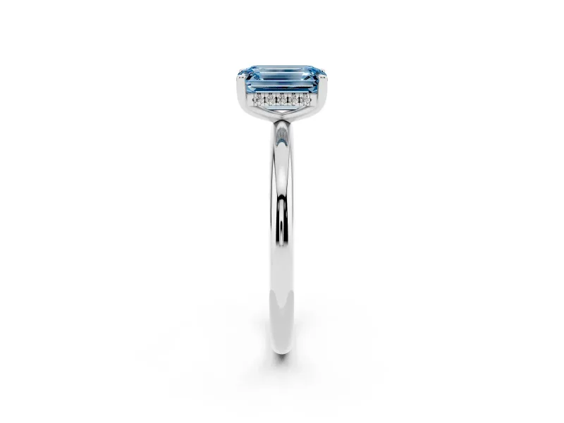 Fancy Blue Emerald Cut Diamond Solitaire Engagement Ring Set in Platinum with Prong Setting and Polished Band