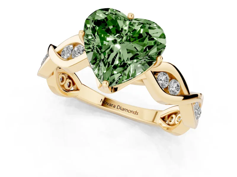 Fancy Green Heart Cut Diamond Twist Band Solitaire Ring Set in Yellow gold with Leaf Prong Setting and Accent Stones