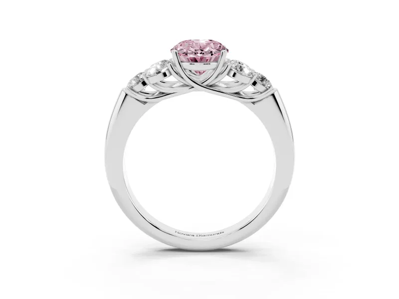 Fancy Pink Oval Cut Diamond Cluster Ring Set in White gold with Round Accent Stones and Prong Setting on a Plain Band
