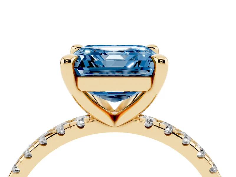 Fancy Blue Asscher Cut Diamond Brilliant Solitaire Ring Set in Yellow gold with Pavé Band and Prong Setting