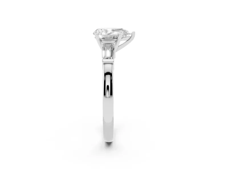 Pear Cut Diamond Solitaire Ring Set in White gold with Tapered Baguette Accents and Prong Setting