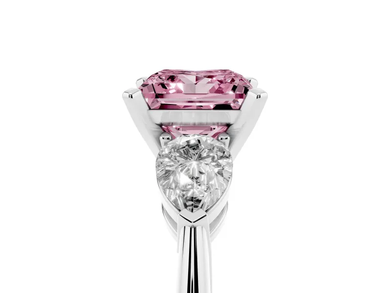 Fancy Pink Three-Stone Princess Cut Diamond Ring Set in Silver with Pear Side Stones and Prong Setting