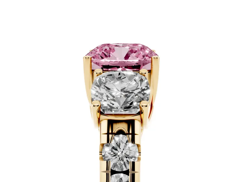Fancy Pink Cushion Cut Diamond Three-Stone Ring Set in Yellow gold with Pavé Band