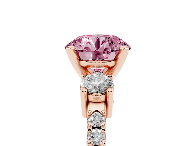 Fancy Pink Three-Stone Round Cut Diamond Pavé Band Ring Set in Rose gold with Prong Setting