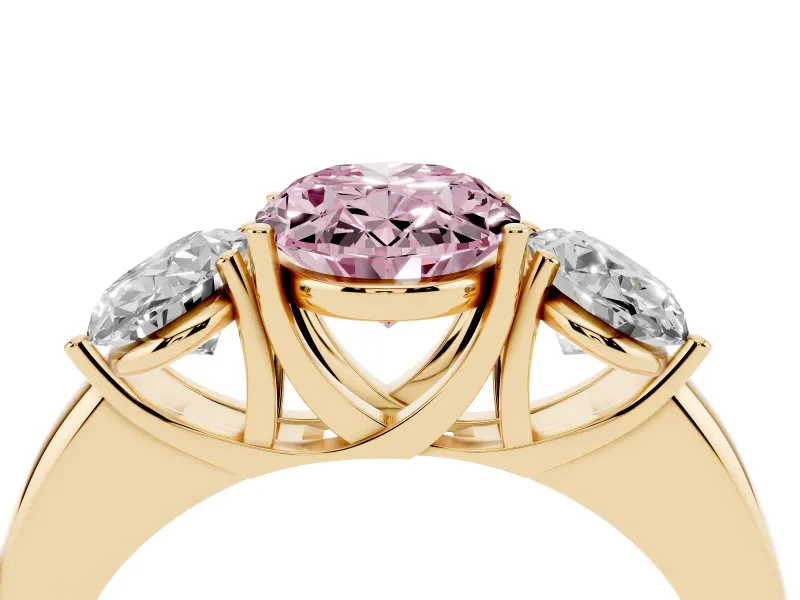 Fancy Pink Oval Cut Diamond Three-Stone Ring Set in Yellow gold with Bold Center and Classic Band