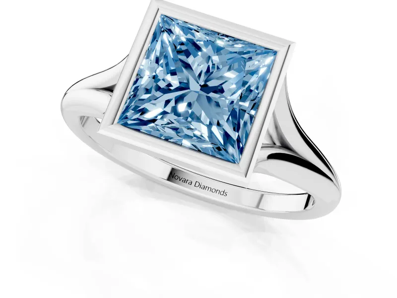 Fancy Blue Bezel Set Princess Cut Diamond Solitaire Ring Set in Silver with Tapered Band