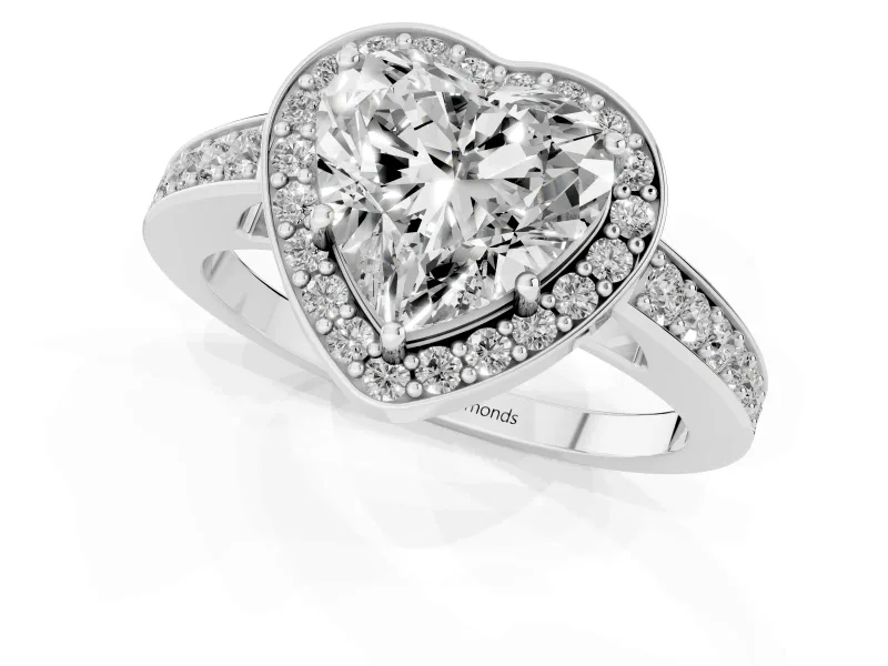 Heart Cut Diamond Halo Pavé Engagement Ring Set in Platinum with Bezel Setting