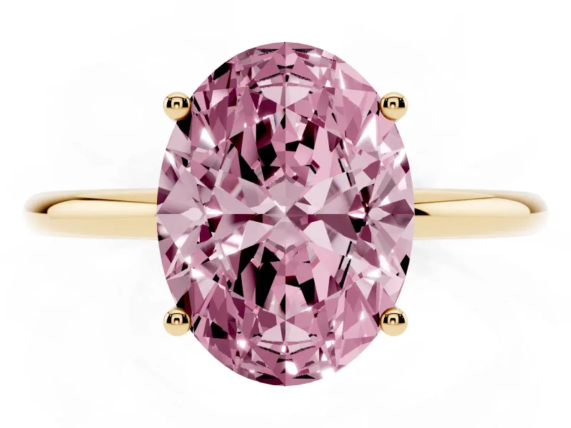 Fancy Pink Oval Cut Diamond Solitaire Engagement Ring Set in Yellow gold with Thin Band and Prong Setting