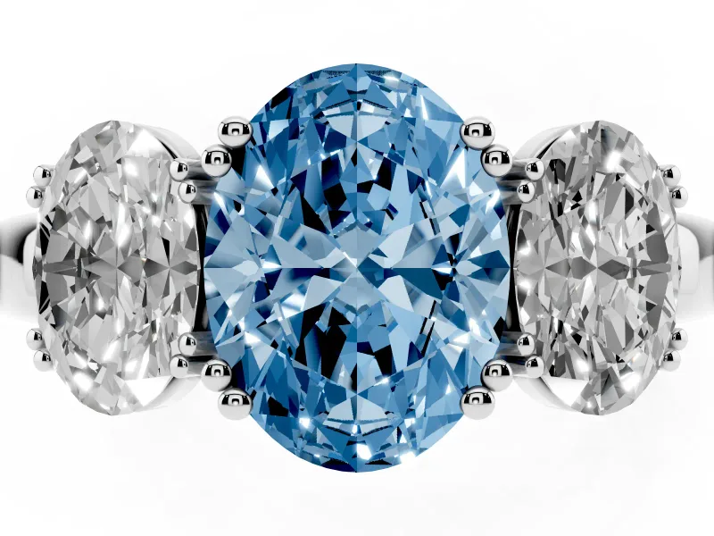Fancy Blue Oval Cut Diamond Three-Stone Ring Set in Platinum with Polished Band and Prong Setting