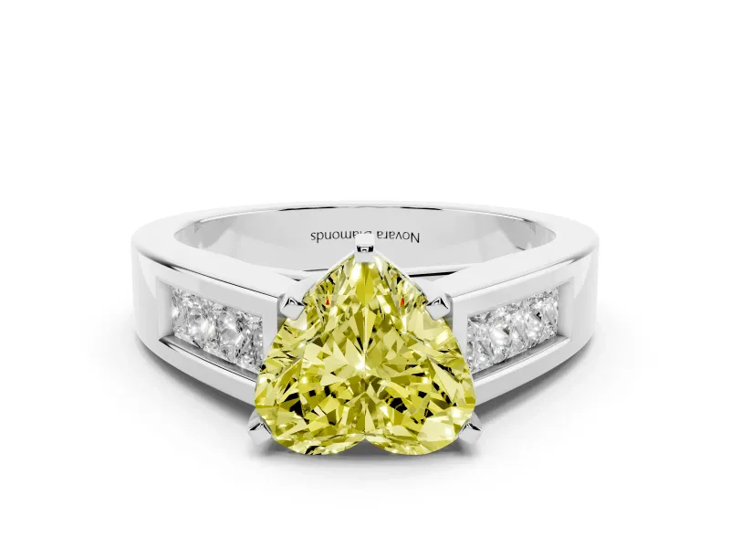 Fancy Yellow Heart Cut Diamond Solitaire Ring Set in White gold with Channel-Set Accent Stones and Prong Setting