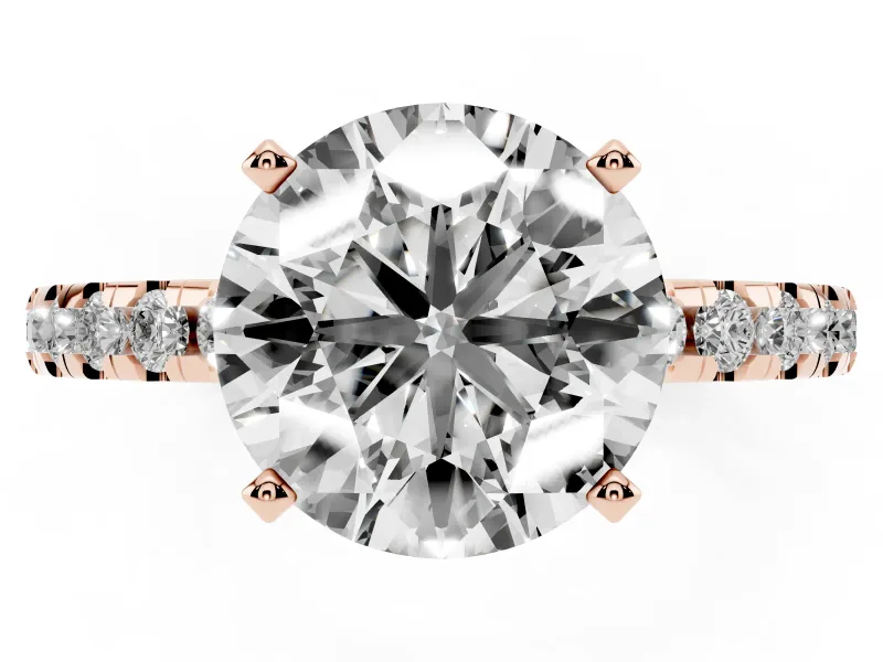 6 Carat Round Cut Pavé Solitaire Ring Set in Rose gold with Round Band Accents and Prong Setting