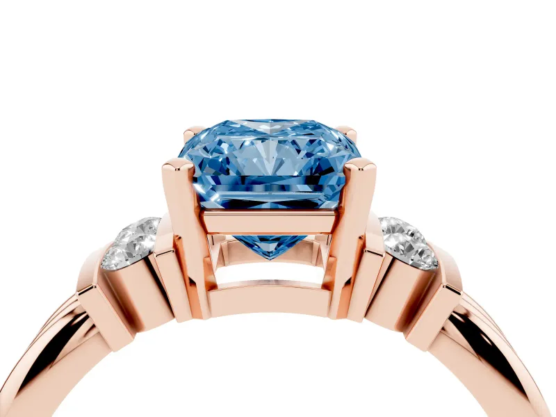 Fancy Blue Three-Stone Radiant Cut Diamond Channel Set Ring Set in Rose gold with Bar Prongs