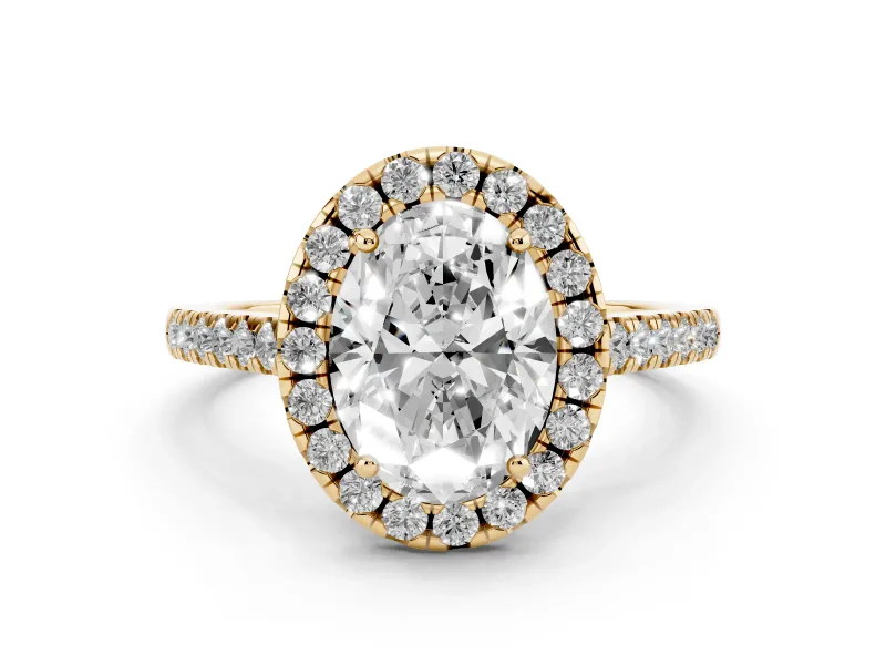 Oval Cut Diamond Pavé Halo Engagement Ring Set in Yellow gold with Pavé Band and Prong Setting