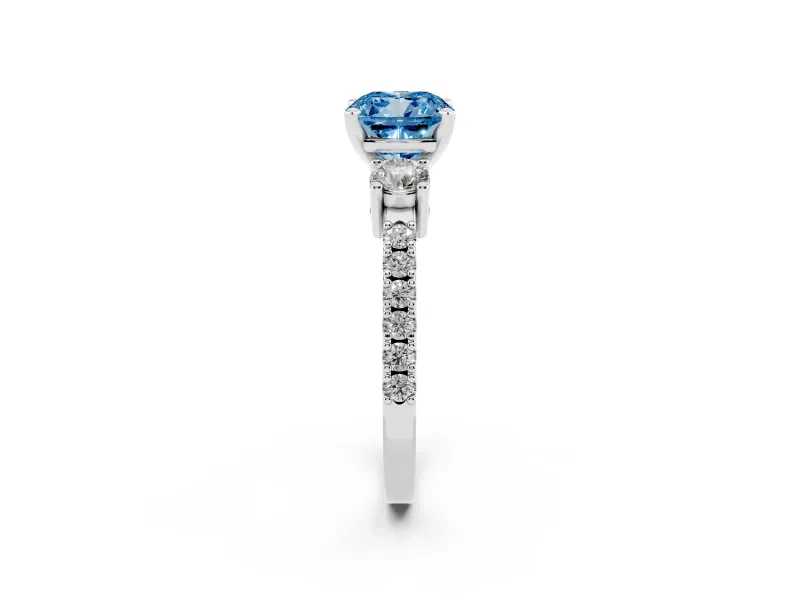 Fancy Blue Three-Stone Cushion Cut Diamond Pavé Band Ring Set in Platinum with Prong Setting