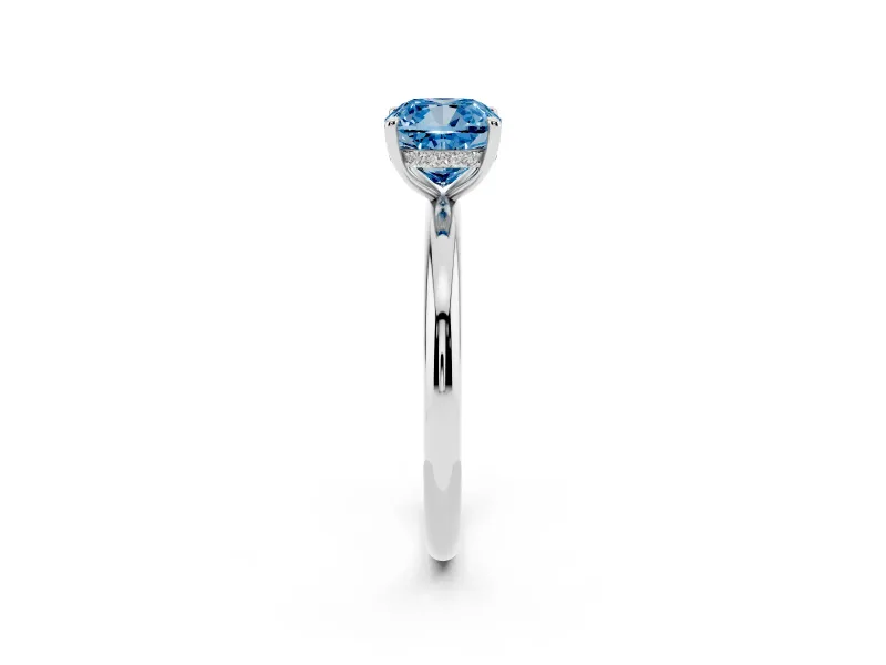 Fancy Blue Cushion Cut Diamond Solitaire Ring Set in White gold with Thin Band and Prong Setting