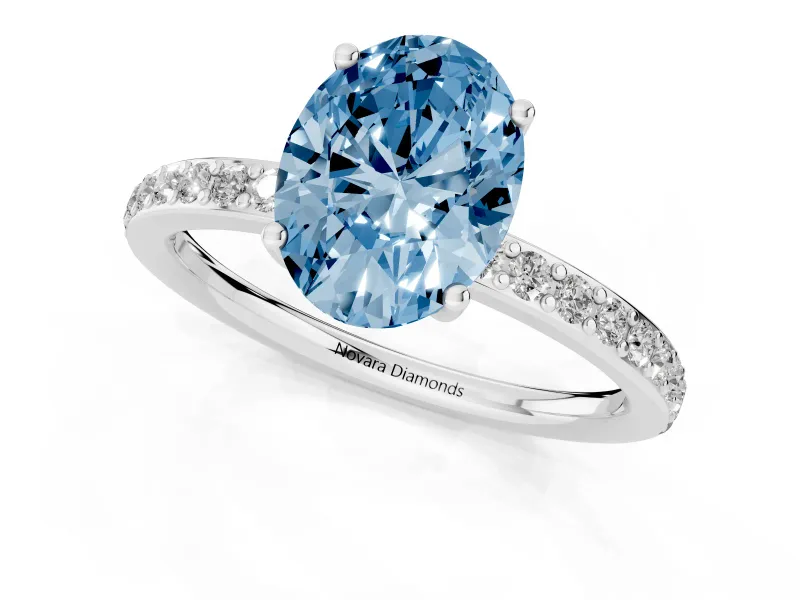Fancy Blue Oval Cut Diamond Pavé Band Ring Set in Silver with Prong-Set Center Stone
