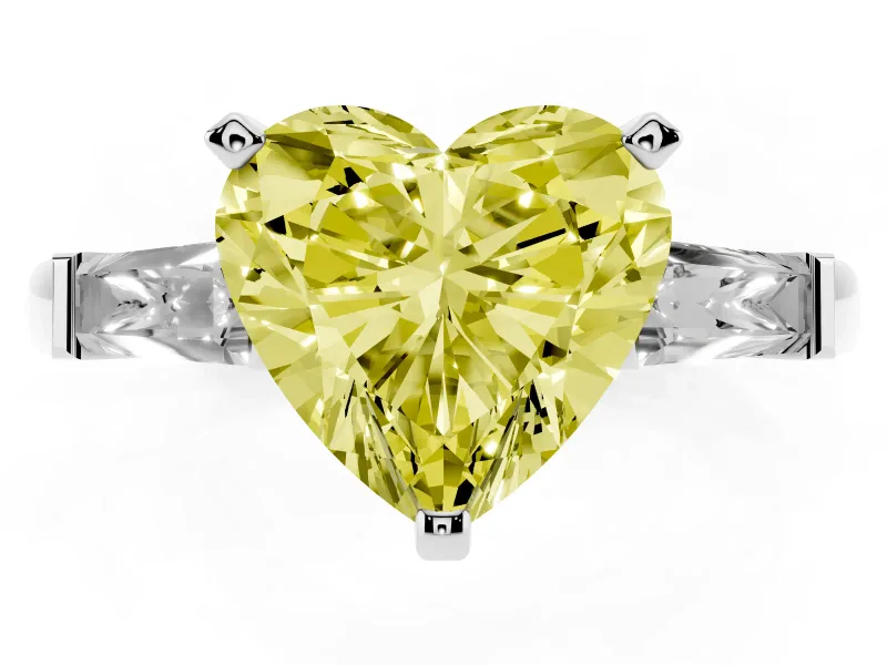 Fancy Yellow Heart Cut Diamond Solitaire Ring Set in Silver with Tapered Baguette Side Stones and Prong Setting