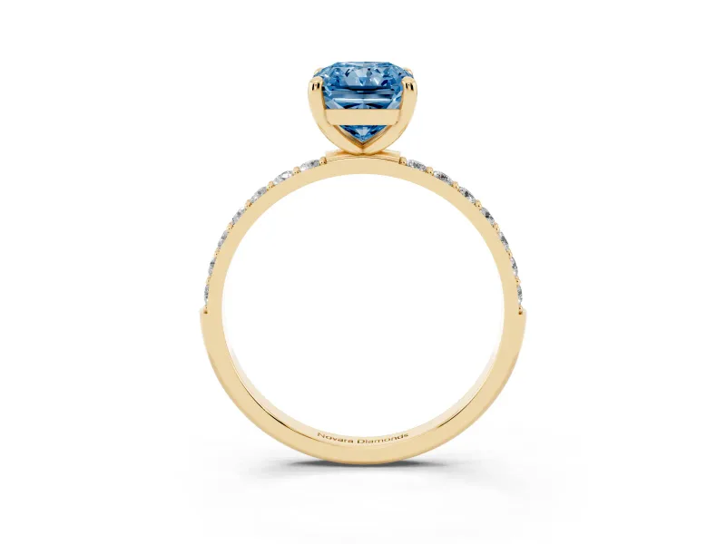 Fancy Blue Radiant Cut Diamond Solitaire Ring Set in Yellow gold with Round Pavé Band and Prong Setting