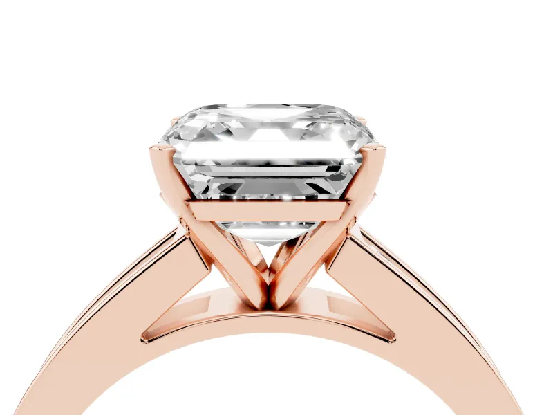 Asscher Cut Diamond Solitaire Ring Set in Rose gold with Channel-Set Band and Prong Setting
