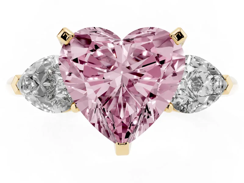 Fancy Pink Three-Stone Heart Cut Diamond Ring Set in Yellow gold with Pear Side Stones and Prong Setting