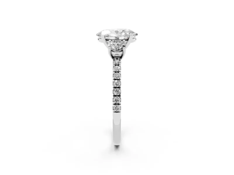 Oval Cut Diamond Three-Stone Ring Set in Silver with Pavé Band and Graduated Sides