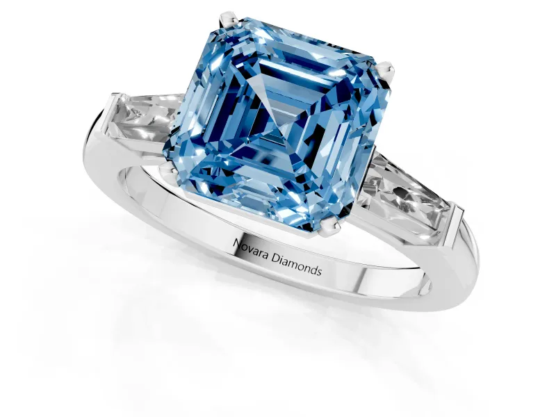 Fancy Blue Asscher Cut Diamond Solitaire Ring Set in Silver with Tapered Baguette Side Stones and Prong Setting