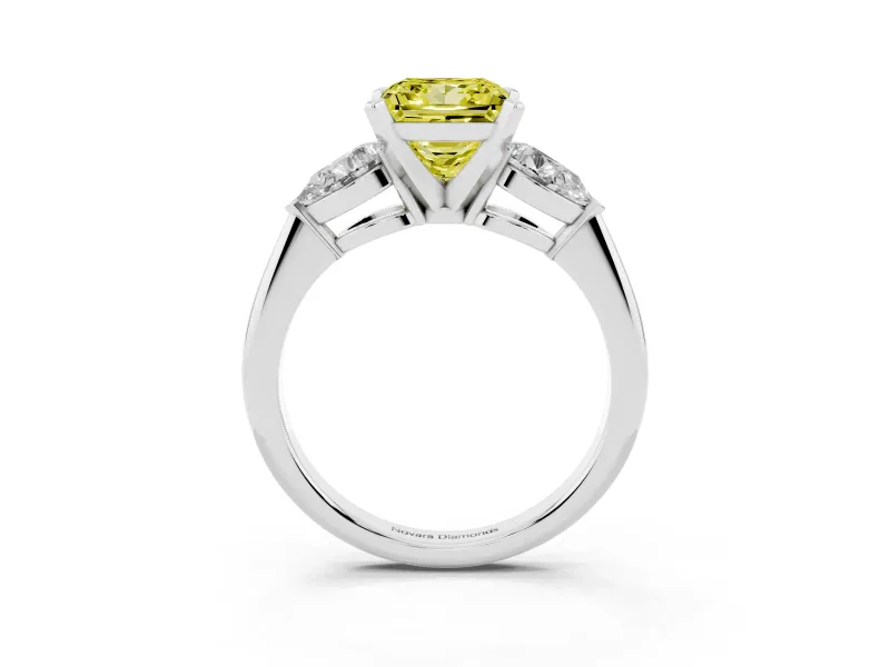 Fancy Yellow Three-Stone Princess Cut Diamond Ring Set in Platinum with Pear Side Stones and Prong Setting