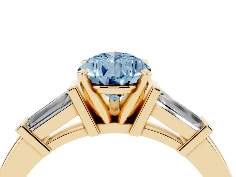 Fancy Blue Pear Cut Diamond Solitaire Ring Set in Yellow gold with Tapered Baguette Accents and Prong Setting