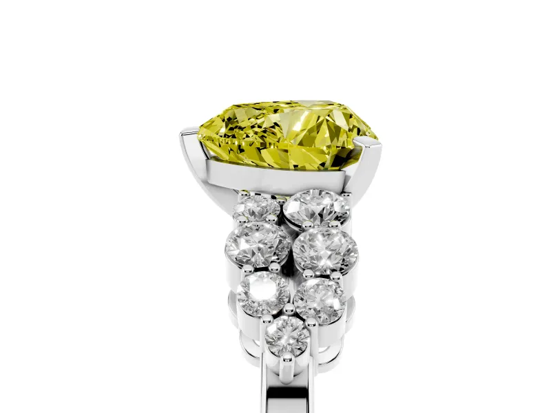 Fancy Yellow Heart Cut Diamond Cluster Engagement Ring Set in White gold with Pavé Band and Prong Setting