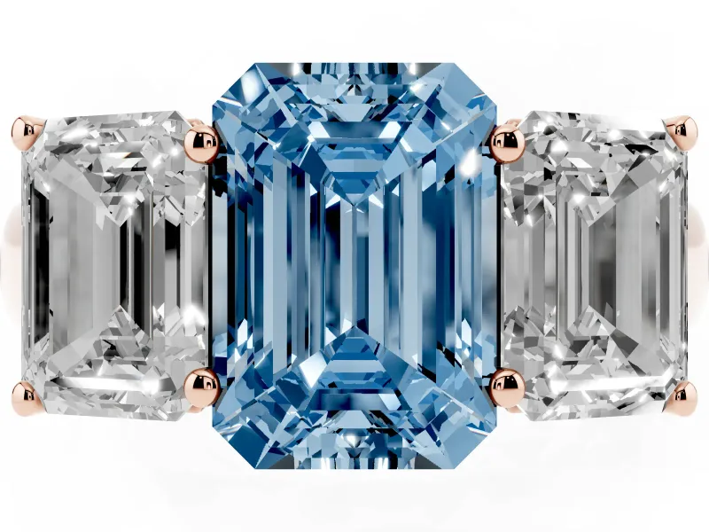 Emerald Cut Three Stone Engagement Ring Setting for a Fancy Blue Lab-Grown Diamond | Basket Prong Heads | Rose Gold