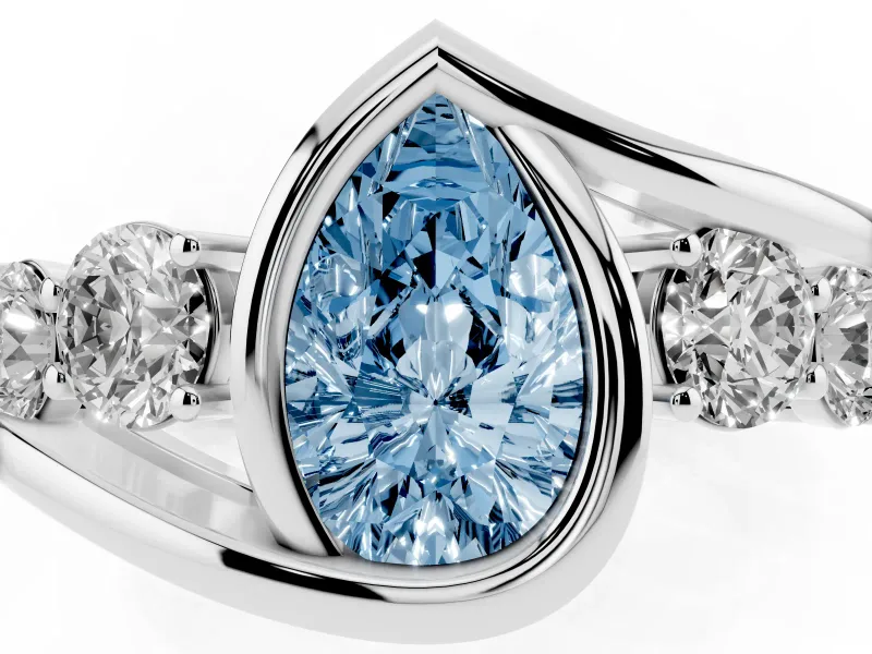 Fancy Blue Pear Cut Diamond Bezel Bypass Ring Set in Silver with Round Accents