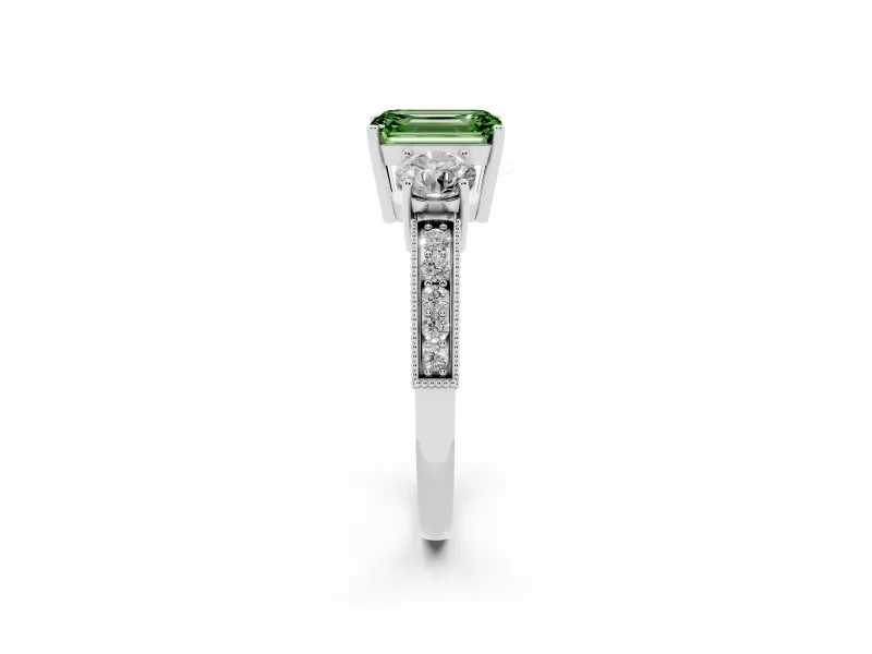 Fancy Green Emerald Cut Diamond Three-Stone Ring Set in White gold with Round Side Stones and Pavé Band