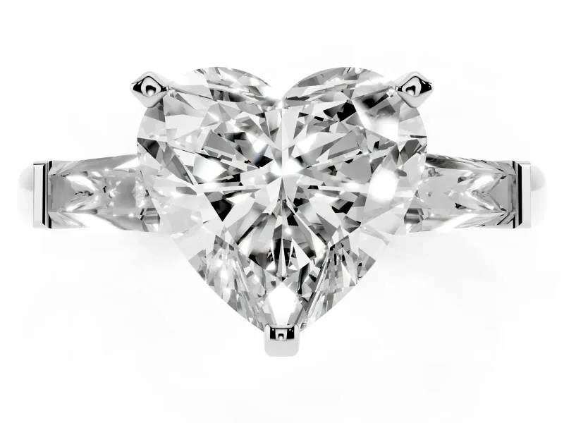 Heart Cut Diamond Solitaire Ring Set in White gold with Tapered Baguette Side Stones and Prong Setting