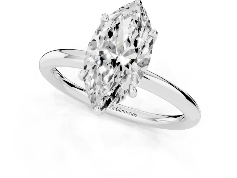 Marquise Cut Diamond Solitaire Ring Set in Platinum with Thin Band and Prong Setting