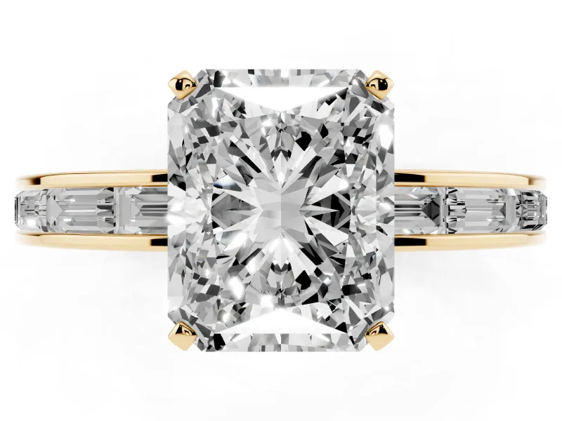 Radiant Cut Diamond Solitaire Ring Set in Yellow gold with Channel-Set Baguette Band and Prong Setting